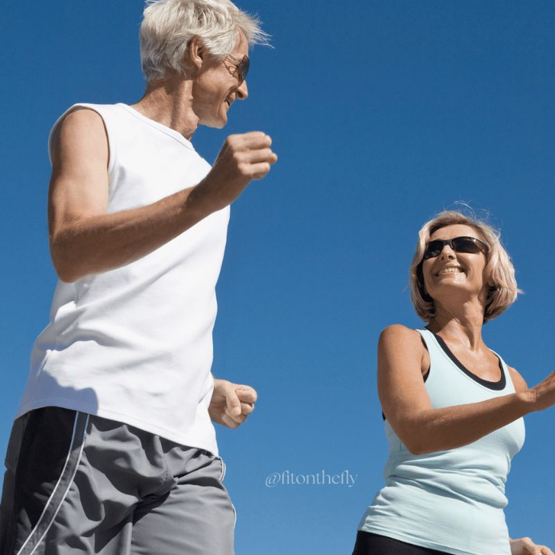 Older couple walking outdoors as daily activities of daily living for heart health and longevity
