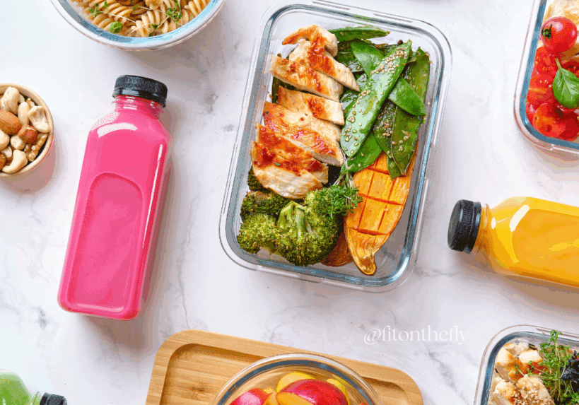 Colorful meal prep with drinks and snacks.