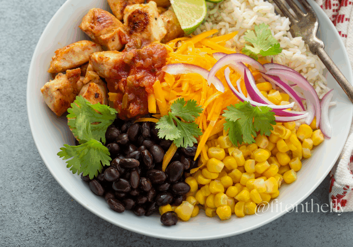 Healthy mexican-inspired meal plan - Salsa Chicken Bowl With Brown Rice, Black Beans, Corn, And Fresh Toppings