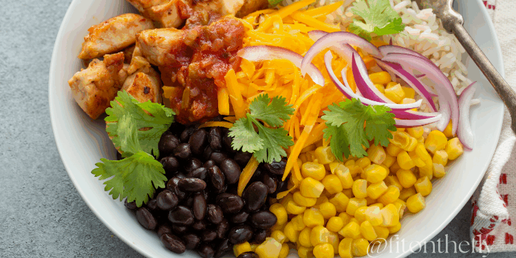 Healthy mexican-inspired meal plan - Salsa Chicken Bowl With Brown Rice, Black Beans, Corn, And Fresh Toppings